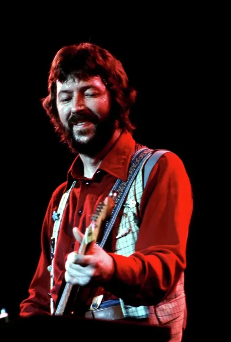 Gerahmter Druck : Clapton spielt. Gerahmter Druck : Clapton spielt.