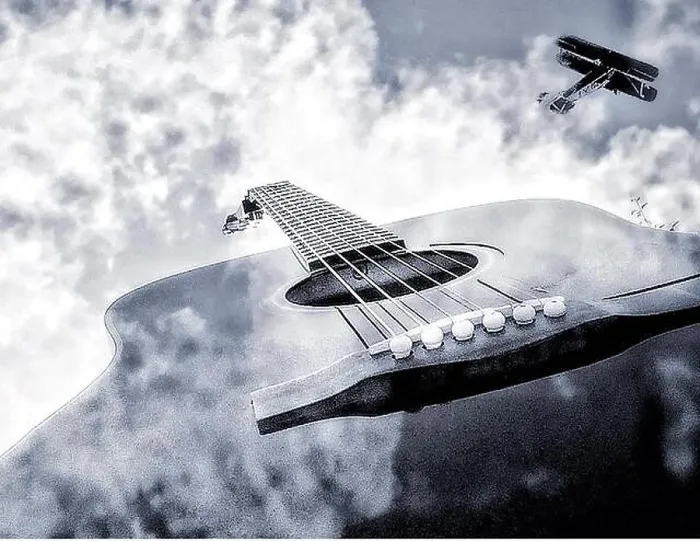 Gerahmter Druck : Gitarrenwolken und Flugzeug. Gerahmter Druck : Gitarrenwolken und Flugzeug.