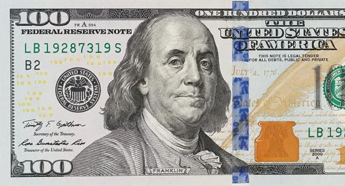 Gerahmter Druck : Ein Bild eines Teils einer 100-Dollar-Note.