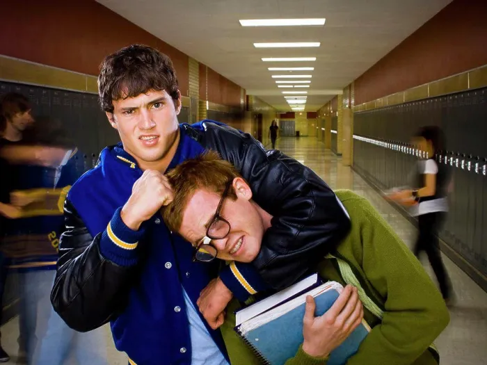 Gerahmter Druck : High-School-Jock und Nerd