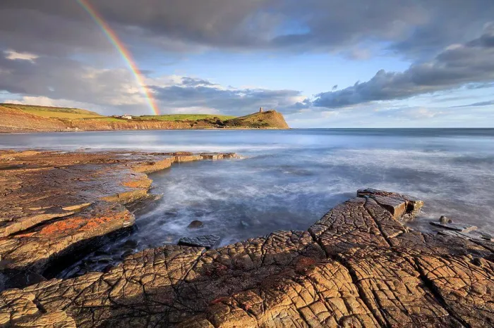 Gerahmter Druck : Regenbogen über Kimmeridge Bay Gerahmter Druck : Regenbogen über Kimmeridge Bay
