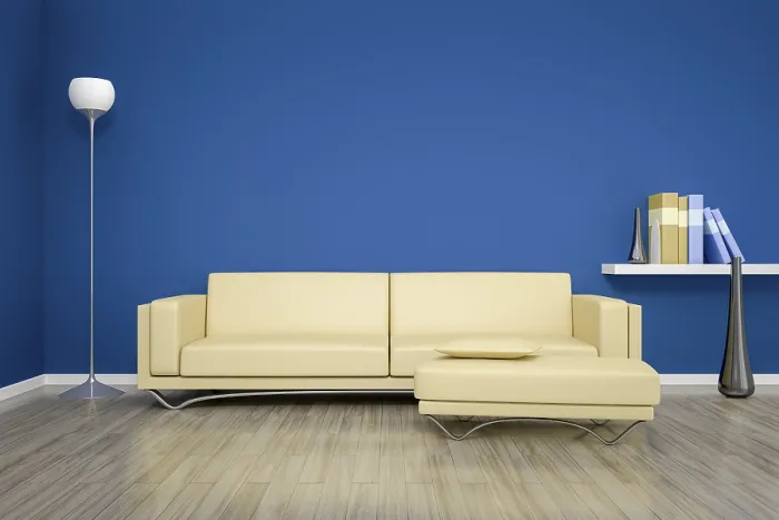 Gerahmter Druck : 3D-Rendern eines blauen Raumes mit einem beigen Sofa. Gerahmter Druck : 3D-Rendern eines blauen Raumes mit einem beigen Sofa.