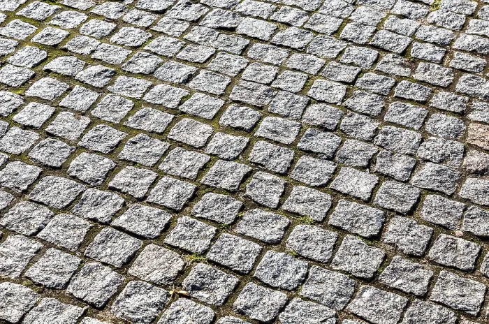 Gerahmter Druck : Abstrakter Hintergrund aus Klinkern, die aus grob behauenen Steinblöcken hergestellt sind. Gerahmter Druck : Abstrakter Hintergrund aus Klinkern, die aus grob behauenen Steinblöcken hergestellt sind.