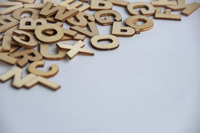 Gerahmter Druck : Alphabeten auf Hintergrund mit Abdeckung, mit anpassbarer Platz für Text.