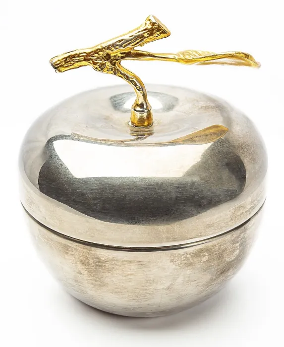 Gerahmter Druck : Ein Silberapfel mit einem Stiel aus Gold. Gerahmter Druck : Ein Silberapfel mit einem Stiel aus Gold.