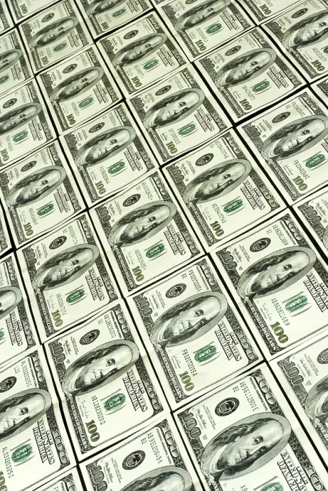 Gerahmter Druck : Hintergrund von hunderten Dollar-Scheinen. Gerahmter Druck : Hintergrund von hunderten Dollar-Scheinen.