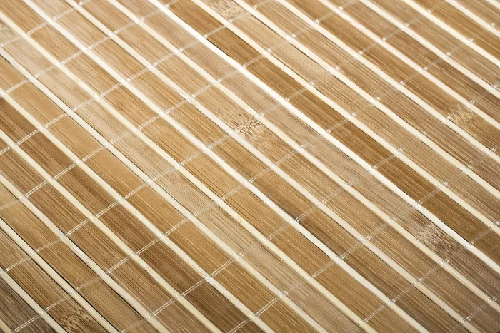 Gerahmter Druck : Bambus-Platte oder -Matte im Hintergrund. Gerahmter Druck : Bambus-Platte oder -Matte im Hintergrund.