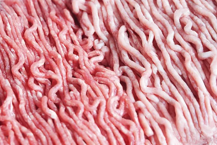 Gerahmter Druck : Rind- und Schweinefleischhack in den Hintergrund. Gerahmter Druck : Rind- und Schweinefleischhack in den Hintergrund.