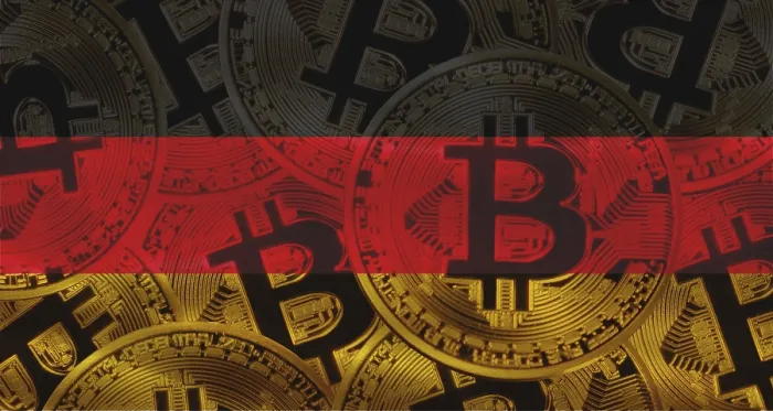 Gerahmter Druck : Bitcoins auf Hintergrund der deutschen Flagge. Gerahmter Druck : Bitcoins auf Hintergrund der deutschen Flagge.