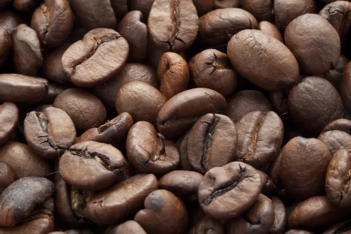 Gerahmter Druck : Nahaufnahme von braunen Kaffeebohnen, Hintergrundtextur. Gerahmter Druck : Nahaufnahme von braunen Kaffeebohnen, Hintergrundtextur.