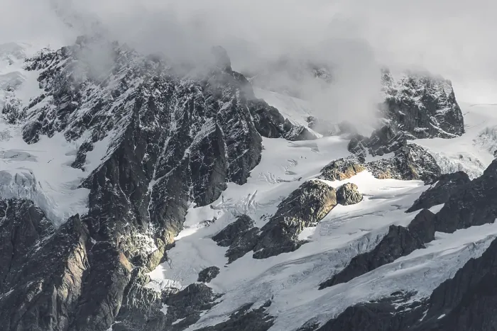 Gerahmter Druck : Wolken über Gletscher mit Schnee. Gerahmter Druck : Wolken über Gletscher mit Schnee.