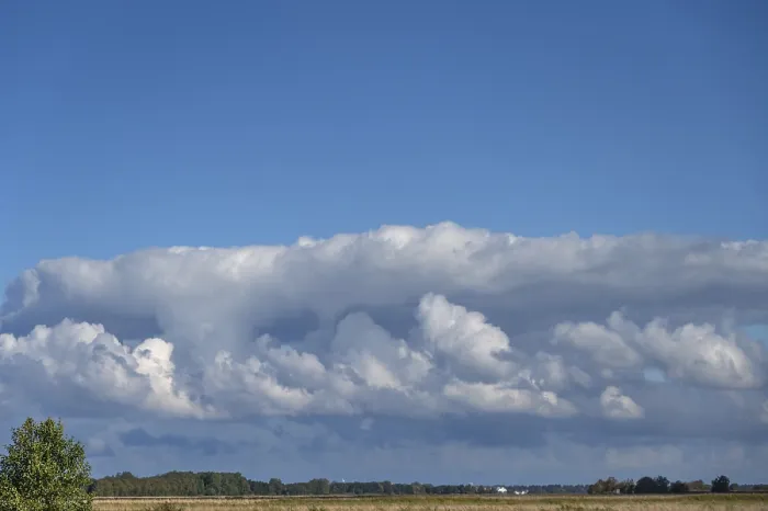 Gerahmter Druck : Wolken über der Lagunenlandschaft. Gerahmter Druck : Wolken über der Lagunenlandschaft.