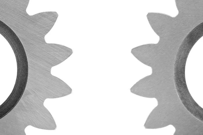 Gerahmter Druck : Zahnrad, Symbol für Teamarbeit. Gerahmter Druck : Zahnrad, Symbol für Teamarbeit.