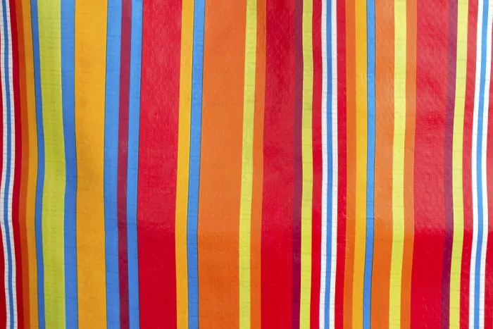 Gerahmter Druck : Farbige Streifen im Detail als Hintergrund. Gerahmter Druck : Farbige Streifen im Detail als Hintergrund.