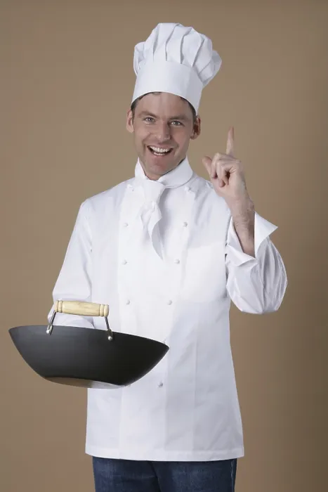 Gerahmter Druck : Kochen mit der Hand in der Pfanne. Gerahmter Druck : Kochen mit der Hand in der Pfanne.