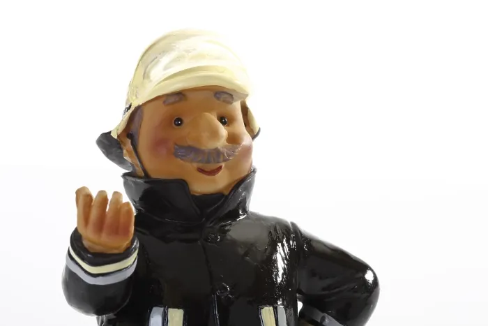 Gerahmter Druck : Schmückende Feuerwehrmann-Figur
