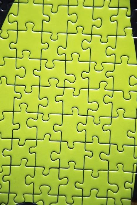 Gerahmter Druck : Verschiedene Puzzlestücke. Gerahmter Druck : Verschiedene Puzzlestücke.
