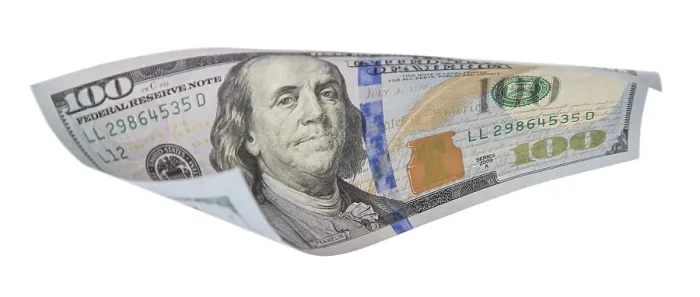 Gerahmter Druck : Ein hundert Dollar-Schein in der Luft. Gerahmter Druck : Ein hundert Dollar-Schein in der Luft.
