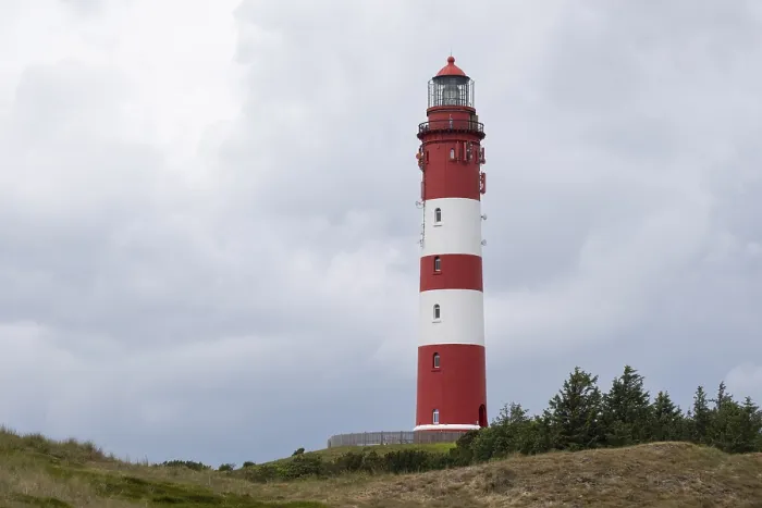 Gerahmter Druck : Dünenlandschaft mit Leuchtturm. Gerahmter Druck : Dünenlandschaft mit Leuchtturm.