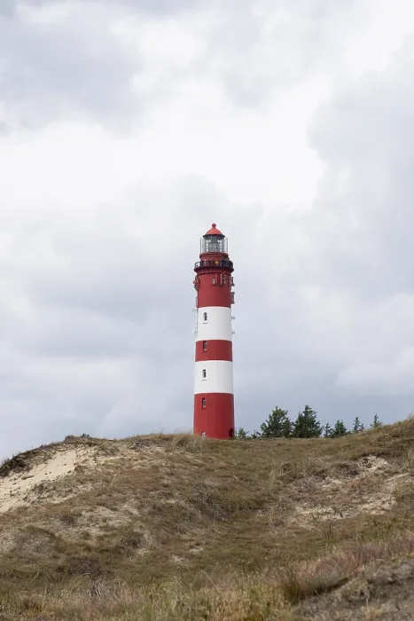 Gerahmter Druck : Dünenlandschaft mit Leuchtturm. Gerahmter Druck : Dünenlandschaft mit Leuchtturm.