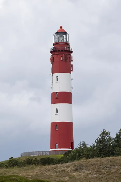 Gerahmter Druck : Dünenlandschaft mit Leuchtturm. Gerahmter Druck : Dünenlandschaft mit Leuchtturm.