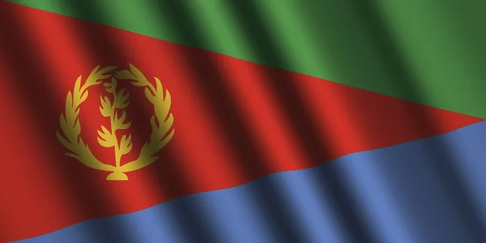 Gerahmter Druck : Die eritreische Flagge weht im Wind.