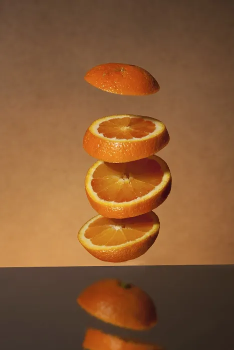 Gerahmter Druck : Fallende Orangenscheiben Gerahmter Druck : Fallende Orangenscheiben