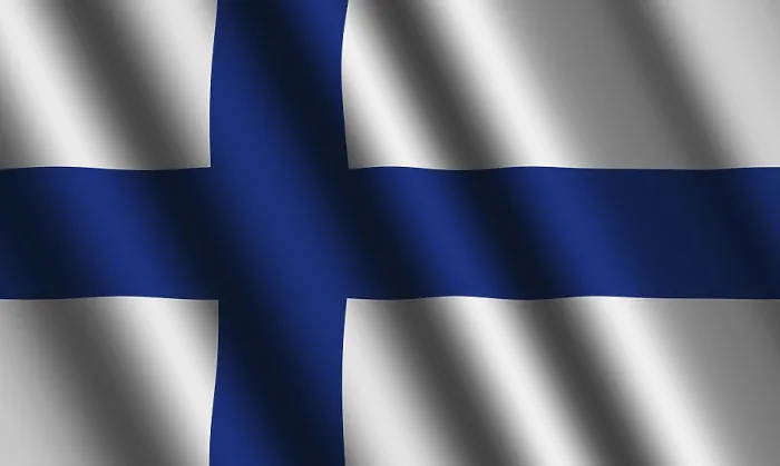 Gerahmter Druck : Das finnische Flagge weht im Wind. Gerahmter Druck : Das finnische Flagge weht im Wind.