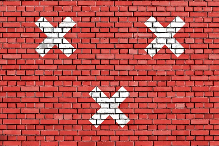 Gerahmter Druck : Flagge von Breda auf Backsteinmauer gemalt. Gerahmter Druck : Flagge von Breda auf Backsteinmauer gemalt.