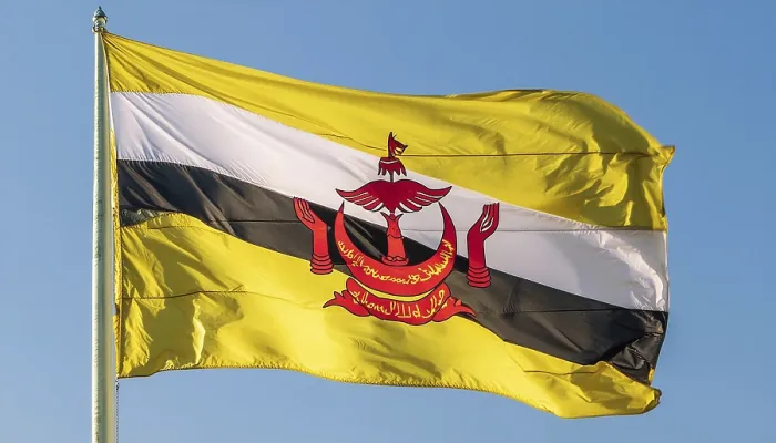Gerahmter Druck : Die Flagge von Brunei flattert im Wind. Gerahmter Druck : Die Flagge von Brunei flattert im Wind.