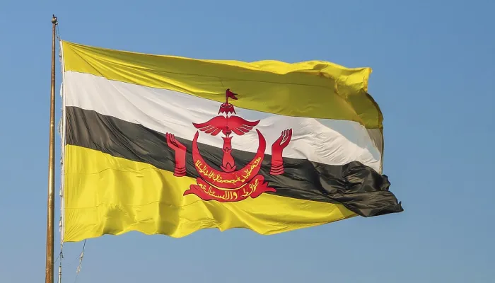 Gerahmter Druck : Die Flagge von Brunei flattert im Wind. Gerahmter Druck : Die Flagge von Brunei flattert im Wind.