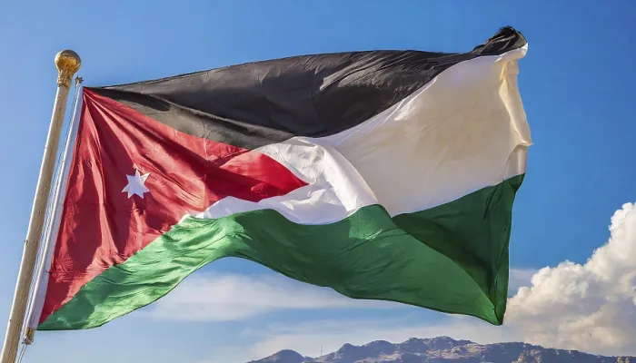 Gerahmter Druck : Die Flagge Jordaniens flattert im Wind. Gerahmter Druck : Die Flagge Jordaniens flattert im Wind.