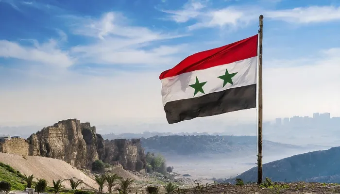 Gerahmter Druck : Die Flagge Syriens flattert im Wind. Gerahmter Druck : Die Flagge Syriens flattert im Wind.