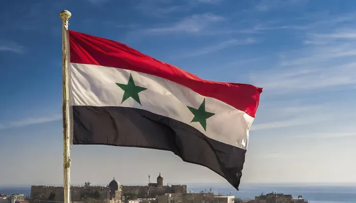 Gerahmter Druck : Die Flagge Syriens flattert im Wind. Gerahmter Druck : Die Flagge Syriens flattert im Wind.