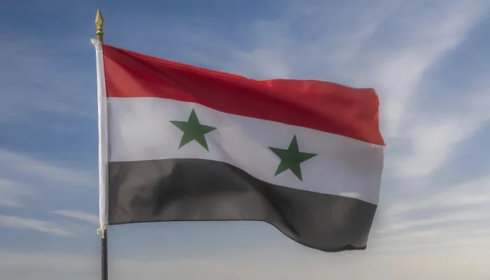 Gerahmter Druck : Die Flagge Syriens flattert im Wind. Gerahmter Druck : Die Flagge Syriens flattert im Wind.