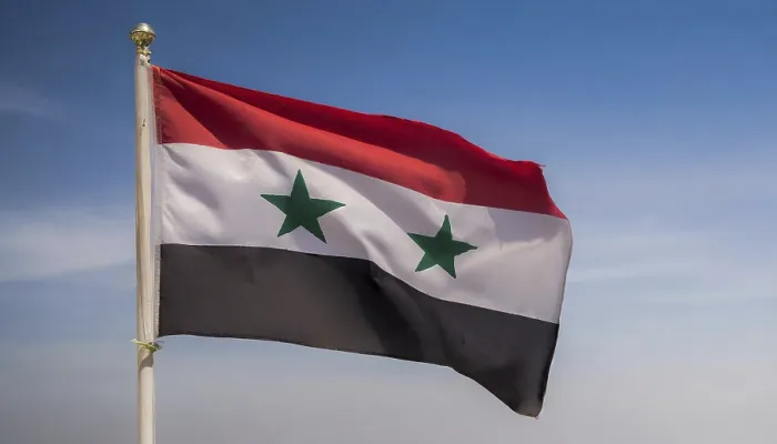 Gerahmter Druck : Die Flagge Syriens flattert im Wind. Gerahmter Druck : Die Flagge Syriens flattert im Wind.
