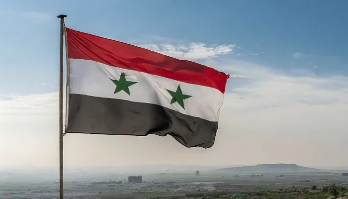 Gerahmter Druck : Die Flagge Syriens flattert im Wind. Gerahmter Druck : Die Flagge Syriens flattert im Wind.