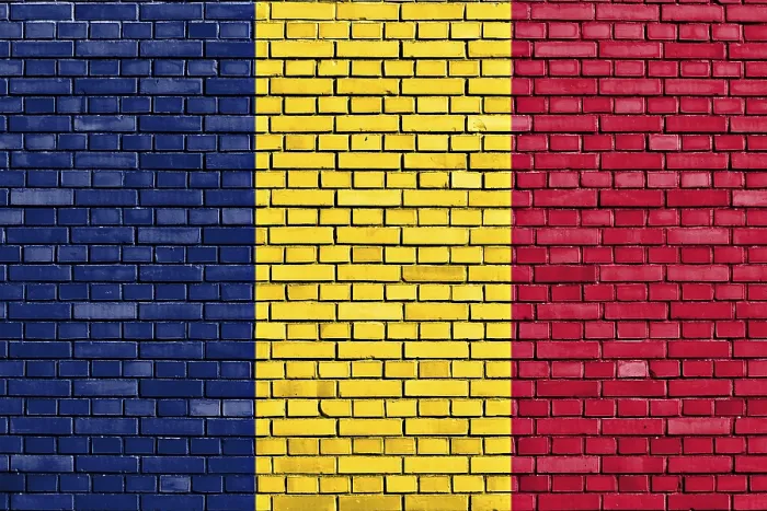 Gerahmter Druck : Flagge des Tschad auf Ziegelmauer. Gerahmter Druck : Flagge des Tschad auf Ziegelmauer.