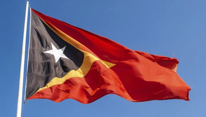 Gerahmter Druck : Die Flagge von Timor weht im Wind. Gerahmter Druck : Die Flagge von Timor weht im Wind.