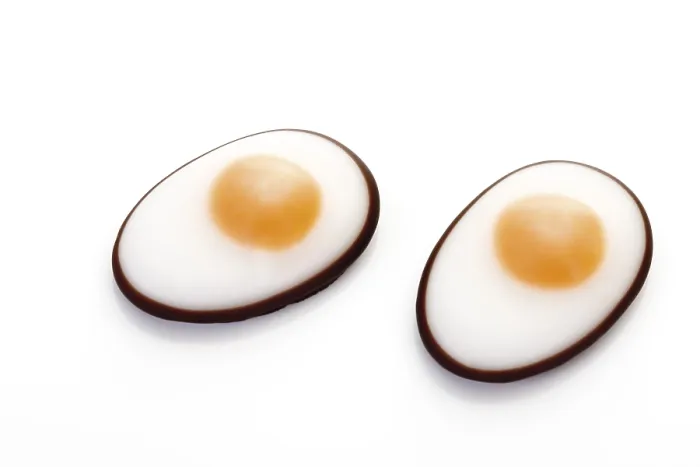 Gerahmter Druck : Eier in Fondant. Gerahmter Druck : Eier in Fondant.