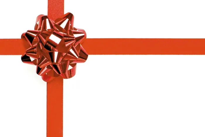 Gerahmter Druck : Geschenkband mit roter Schleife Gerahmter Druck : Geschenkband mit roter Schleife