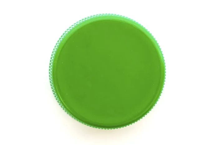 Gerahmter Druck : Grüner Plastikflaschenverschluss. Studioaufnahme. Gerahmter Druck : Grüner Plastikflaschenverschluss. Studioaufnahme.