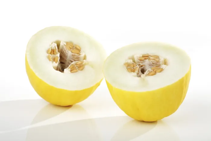 Gerahmter Druck : Honeydew-Melone halbiert. Gerahmter Druck : Honeydew-Melone halbiert.