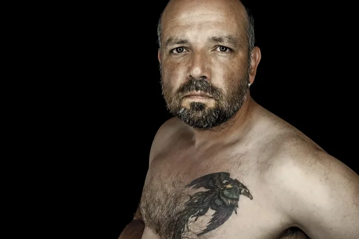 Gerahmter Druck : Ein Bild eines hübschen Mannes mit Bart. Gerahmter Druck : Ein Bild eines hübschen Mannes mit Bart.