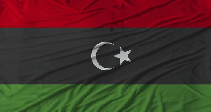 Gerahmter Druck : Die libysche Flagge weht. Flagge von Libyen mit Stofftextur. Gerahmter Druck : Die libysche Flagge weht. Flagge von Libyen mit Stofftextur.