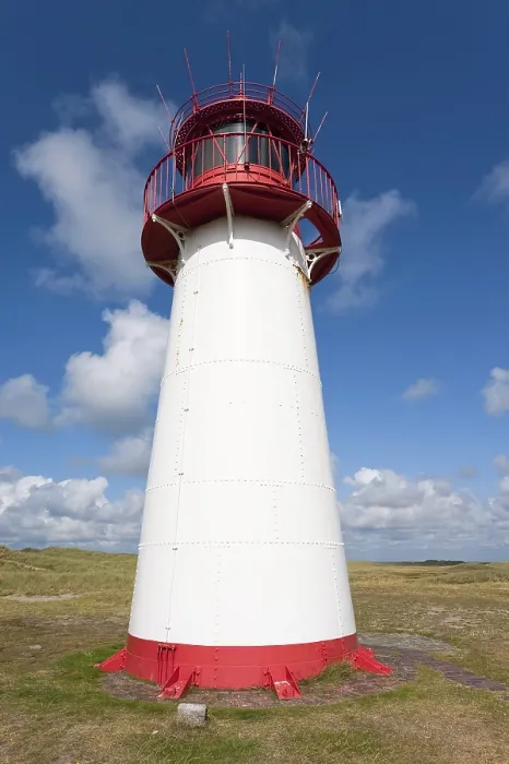 Gerahmter Druck : Leuchtturm mit blauem Himmel bei Ellenbogen. Gerahmter Druck : Leuchtturm mit blauem Himmel bei Ellenbogen.