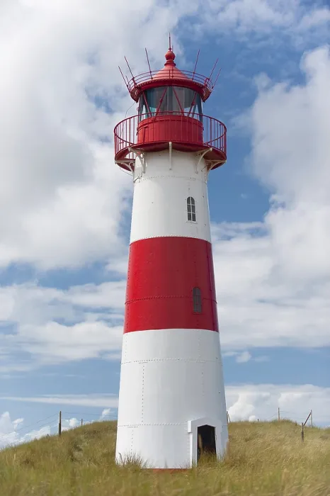 Gerahmter Druck : Leuchtturm mit blauem Himmel bei Ellenbogen. Gerahmter Druck : Leuchtturm mit blauem Himmel bei Ellenbogen.