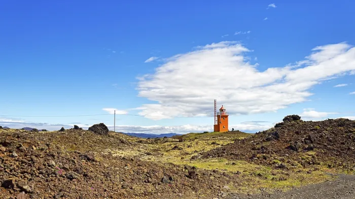 Gerahmter Druck : Leuchtturm in vulkanischer Landschaft. Gerahmter Druck : Leuchtturm in vulkanischer Landschaft.