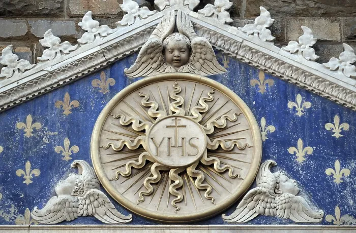 Gerahmter Druck : Medaillon mit dem IHS-Monogramm zwischen zwei Löwen. Gerahmter Druck : Medaillon mit dem IHS-Monogramm zwischen zwei Löwen.