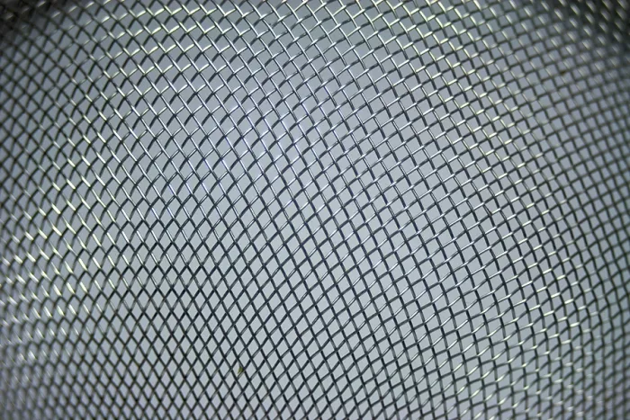 Gerahmter Druck : Metallgitter-Hintergrund aus Filter. Gerahmter Druck : Metallgitter-Hintergrund aus Filter.